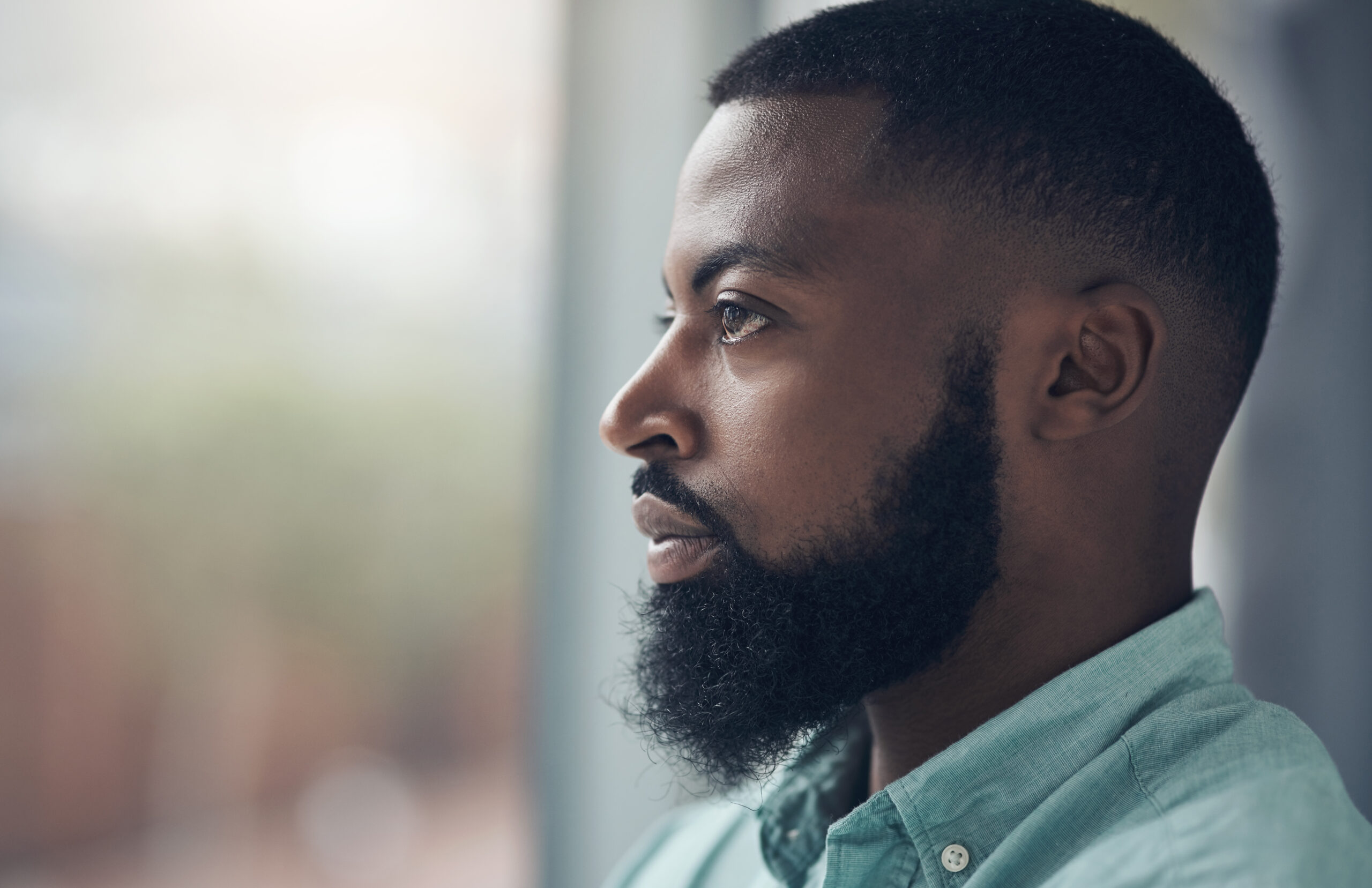 Photo: Young man in thought